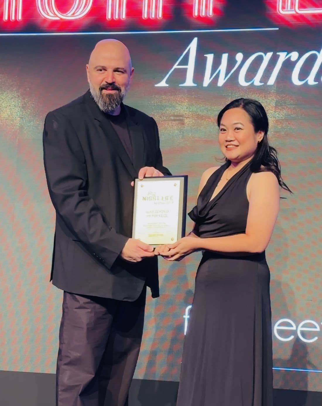 Reform Social & Grill receiving an award