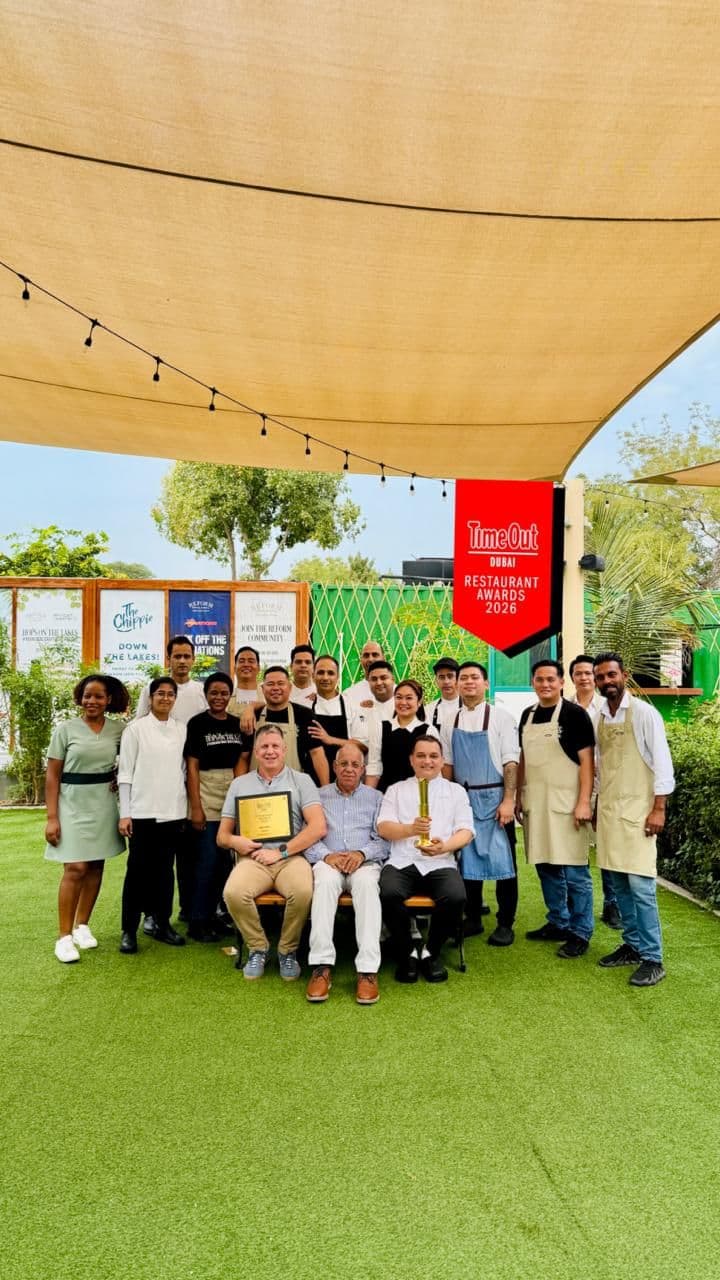 The Reform team celebrating an award in the garden